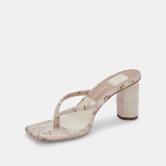 RHYE HEELS IN LT TAUPE EMBOSSED STELLA - Dolce Vita