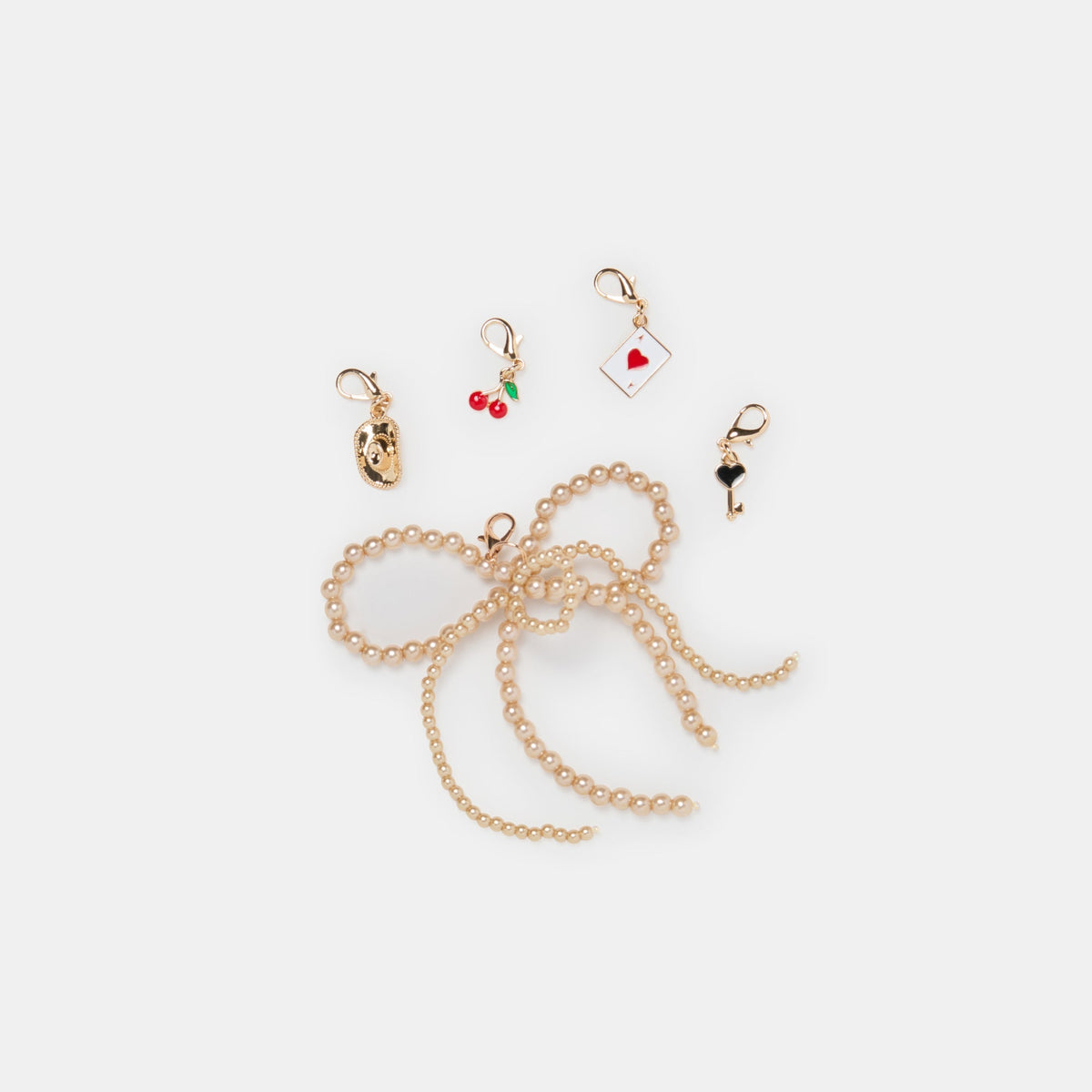 GOLD BOW CHARM PACKAGE ASSORTED